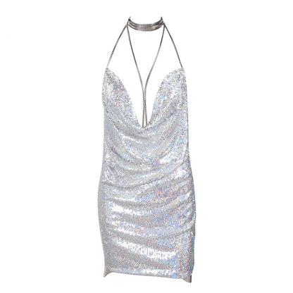 short backless sequin dress worn at event